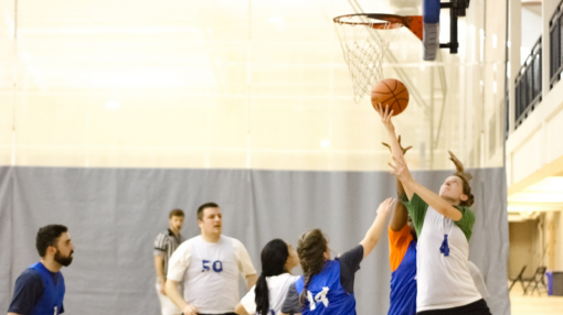 happy group in front of waterfall